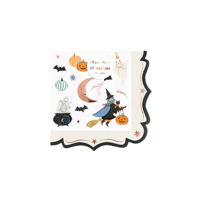 A square Halloween-themed small paper napkin with ornate edges, featuring illustrations of a witch on a broomstick, pumpkins, bats, a cauldron, a crescent moon, and stars on an off-white background in packaging, on a plain white background.