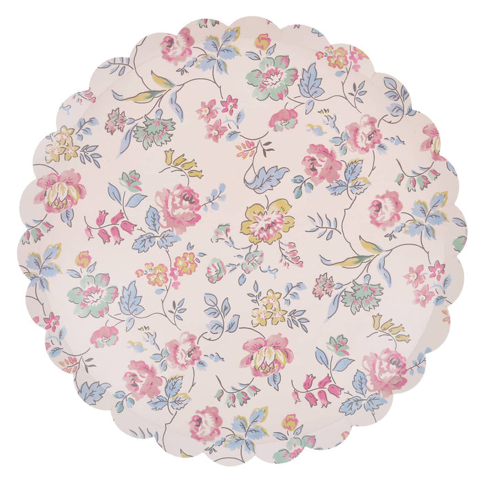 Pink decorative paper dinner plate with delicate pastel floral print and scalloped edge, on a white background.