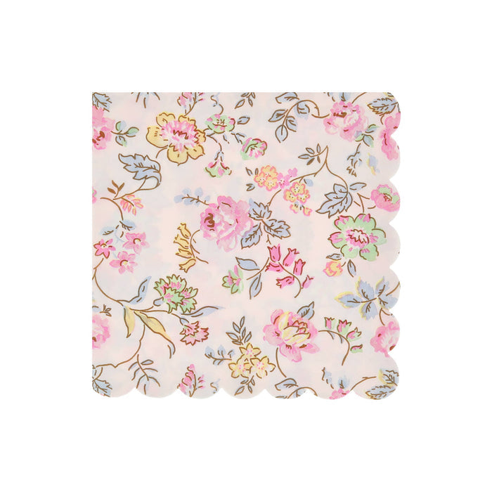 Pink decorative large paper napkin with delicate pastel floral print and scalloped edge, on a white background.