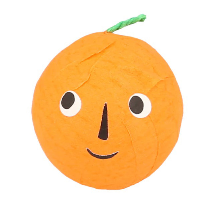 Pumpkin shaped surprise ball with smiley face stickers and green yarn stem.