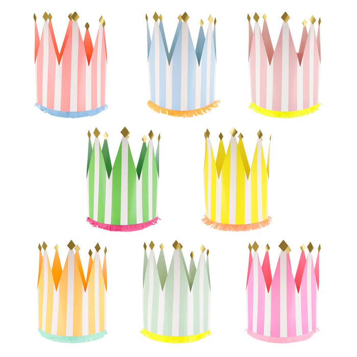 Set of colorful striped paper party crowns on a white background.