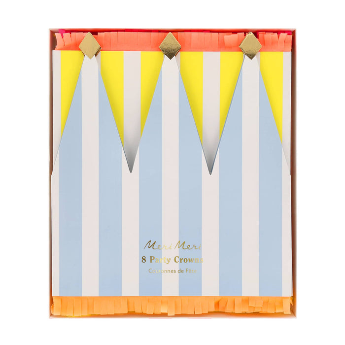 Colorful striped paper party crowns  in packaging on a white background.