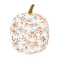 A decorative pumpkin-shaped paper plate with a white background and an orange floral toile pattern, featuring a metallic gold stem at the top, shown on a white background.