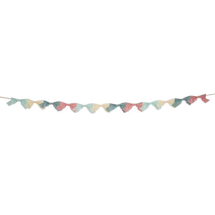 Colorful velvet bow garland, full length shown, on a white background.