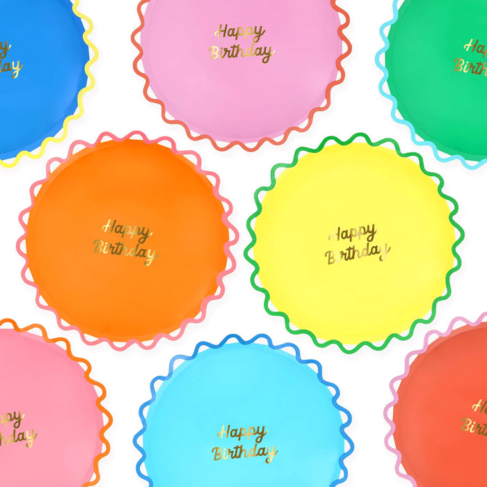 Colorful large paper plates with ric-rac rim and 'Happy Birthday' text in gold foil, on a white background.