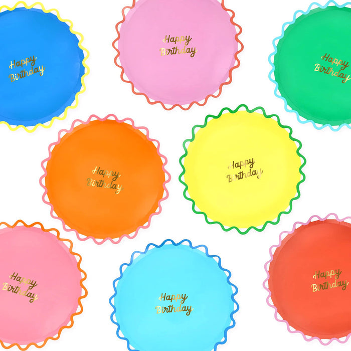 Colorful small paper plates with ric-rac rim and 'Happy Birthday' text in gold foil, on a white background.