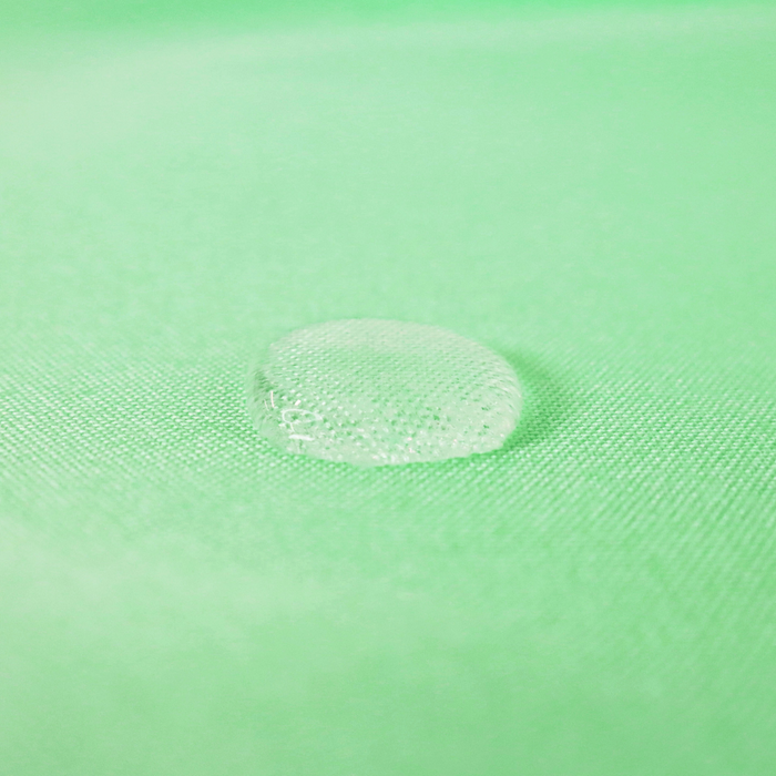 This WPC-Lite is in a refreshing mint green color. This photo shows a water drop on the fabric.