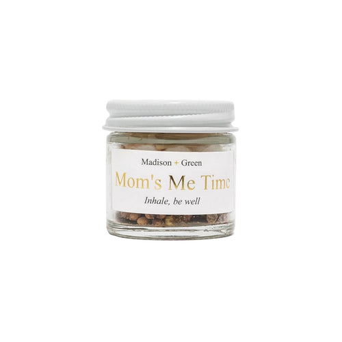 Mom's Me Time aromatherapy inhaler in a glass jar, front view, on a white background.