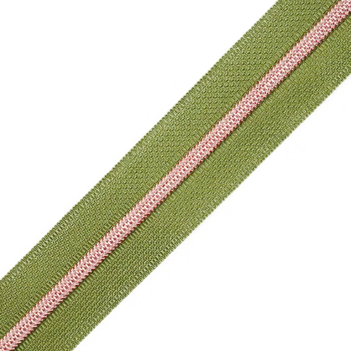 Muted shade of green zipper tape with rose gold coil teeth.