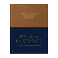Guided journal titled 'My Life in Stories' with a butterfly illustration on a brown and navy cover.
