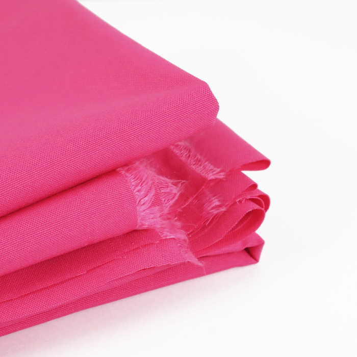 This ReNew Solid is in a bright and saturated shade of pink. This photo is of the fabric folded.