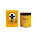 Nopalera tangerine cactus body polish with orange box packaging on a white background.