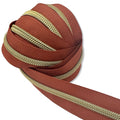 Obstinate Orange | #5 Light Gold Zipper by the Yard - 3 Yard Singles