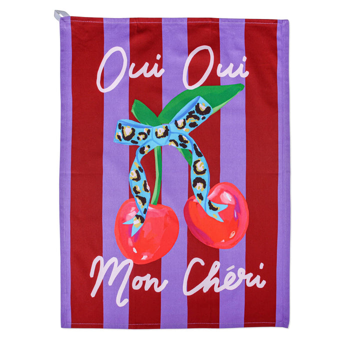 Purple and red striped cotton tea towel with cherries and leopard print bow, featuring text 'Oui Oui Mon Chéri', flat on a white background.
