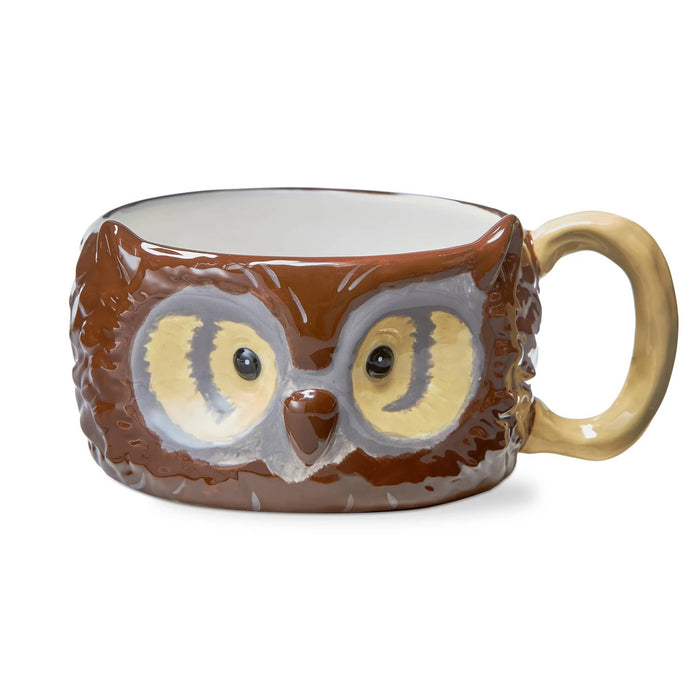 A large ceramic owl-shaped mug with a brown textured body, large yellow and gray eyes, and a beige handle, shown on a white background.