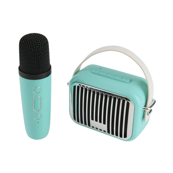 Wireless Express Pocket Karaoke wireless microphone and speaker in teal, slight overhead view.