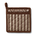 A brown quilted pot holder with a cream and brown striped patterned center panel, an embroidered floral border on the top, and a loop handle on the left side, shown against a plain white background.