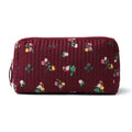 A quilted burgundy cosmetic pouch with a small-scale floral print in pink, yellow, green, and white, front view shown on a plain white background.