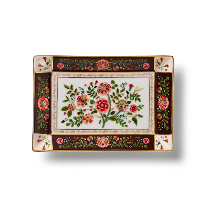 A small rectangular porcelain tray with a white center panel decorated with a colorful floral bouquet, surrounded by a dark burgundy border with red flowers and green leaves, on a white background.