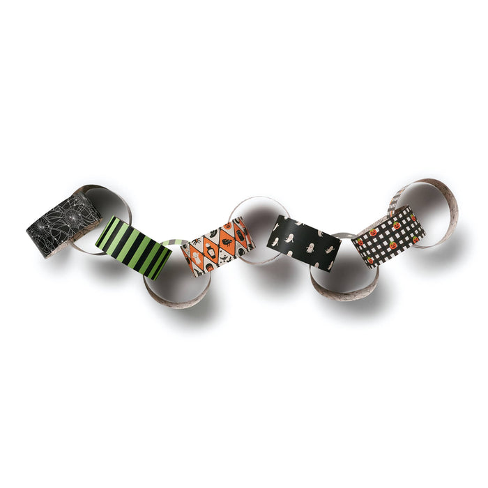 A chain of interlocking paper rings decorated with various Halloween-themed patterns, arranged on a white background with soft drop shadows.