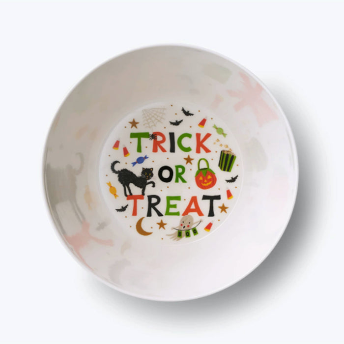A white melamine Halloween-themed bowl with a colorful 'TRICK OR TREAT' design featuring a black cat, pumpkin, candy corn, bats, and stars on the inside, shown on a white background.