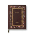 A dark burgundy softcover journal with a decorative floral border and gold foil detailing, featuring the word 'JOURNAL' and the brand 'Rifle Paper Co.' on the cover, shown on a white background.