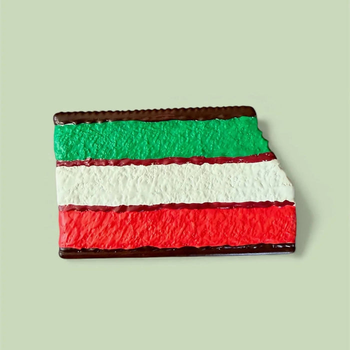Ruby's Rainbow Cookie natural rubber baby teether with red, white, and green stripes on a mint green background.