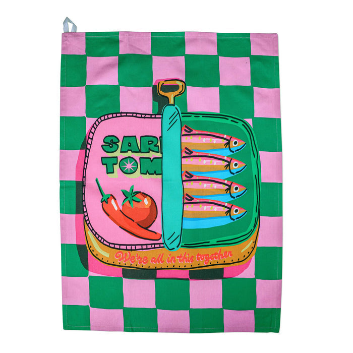 Green and pink checkerboard cotton tea towel with a sardine tin illustration, flat on a white background.
