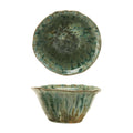 A small stoneware bowl with a scalloped rim, shown from two angles against a white background. The top view shows the interior with a mottled green and brown glaze, and the bottom view shows the exterior with a matching flared rim and textured glaze.