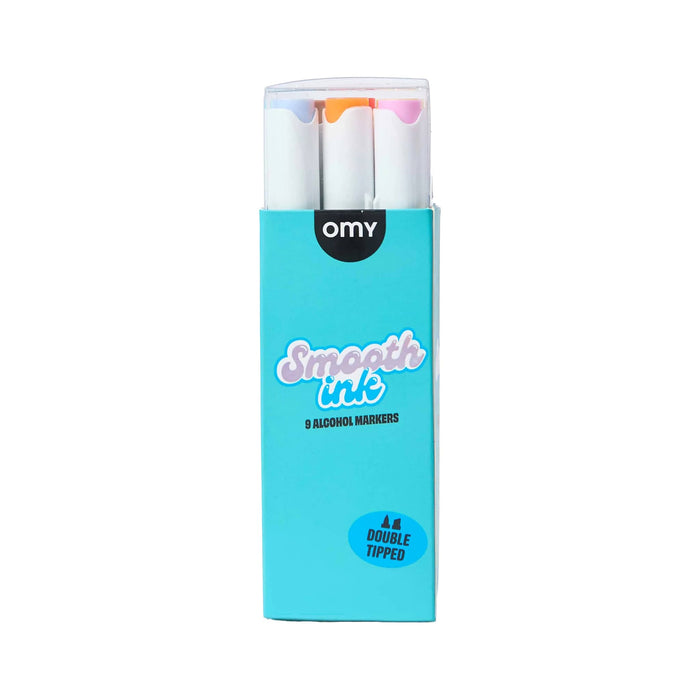 Omy Smooth Ink 9 Alcohol Markers in a light blue box with a clear top, with three visible markers with pastel orange, pink, and blue tips, on a white background.
