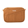 Canvas pouch with multiple pockets in a cinnamon color, front view, on a white background.
