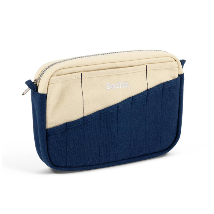 Blue and cream canvas pouch with a brand logo on a white background.