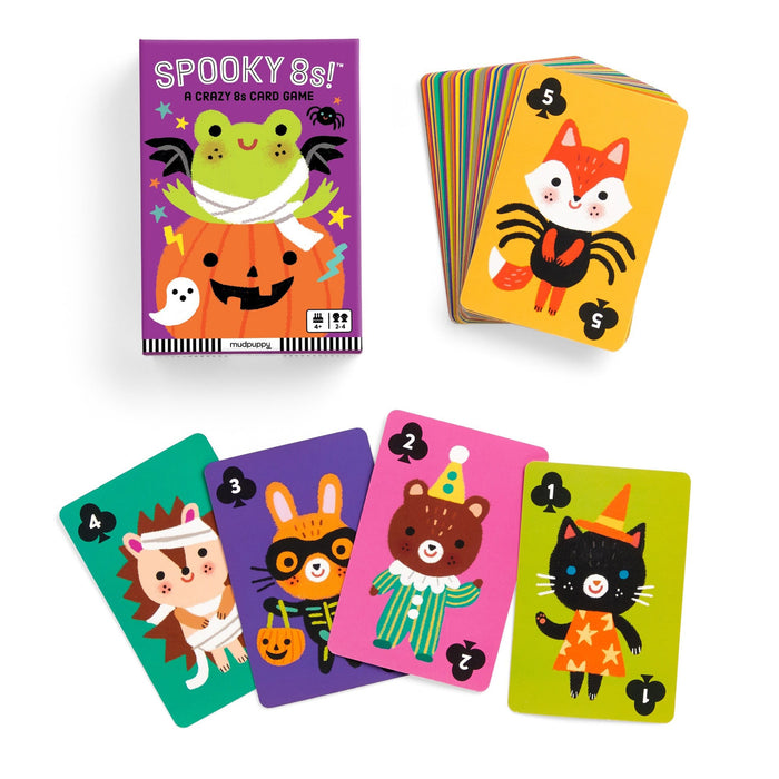 Halloween-themed card game with colorful cards and packaging on a white background