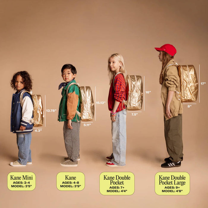 Four children modeling gold-colored backpacks of different sizes against a solid beige background, with text labels showing the dimensions of each backpack model.