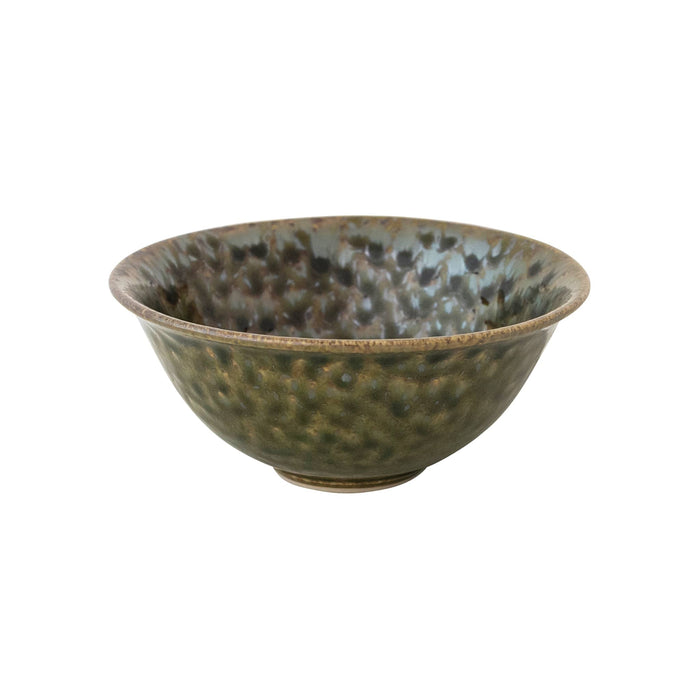 A handmade stoneware bowl with a textured glaze in earthy olive green and brown tones, side view on a white background.