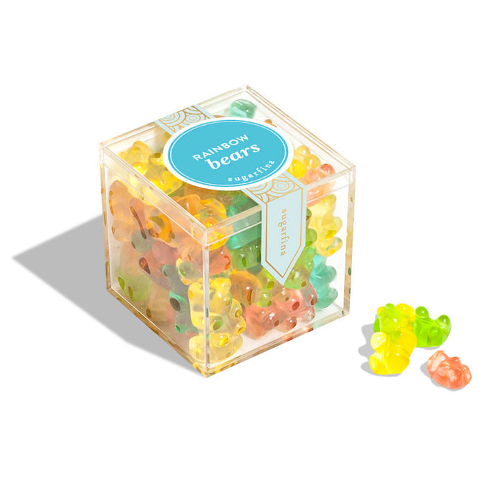sugarfina fruit flavored rainbow bear gummy candy in yellow, green, orange blue and red in clear plastic candy cube with sticker closure