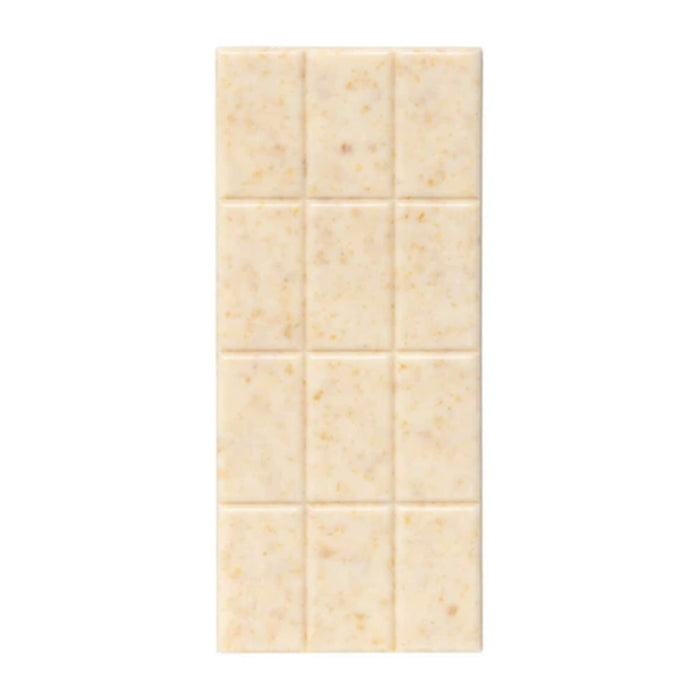 A rectangular cream-colored white chocolate candy bar with 12 sections, on a plain white background.