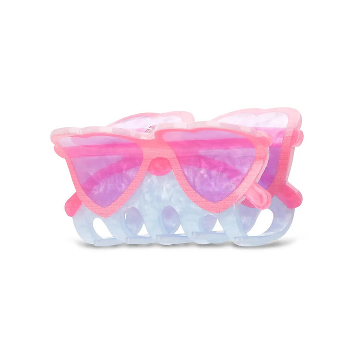 Hair claw clip with heart-shaped sunglasses design, side angle, on a white background.