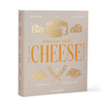 Printworks The Essentials Cheese Tools for Cheese Lovers, set of 3 stainless steel cheese knives in beige book box packaging, front and side angle view.