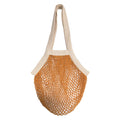A goldenrod cotton net bag with cream-colored woven handles and trim, shown against a plain white background.