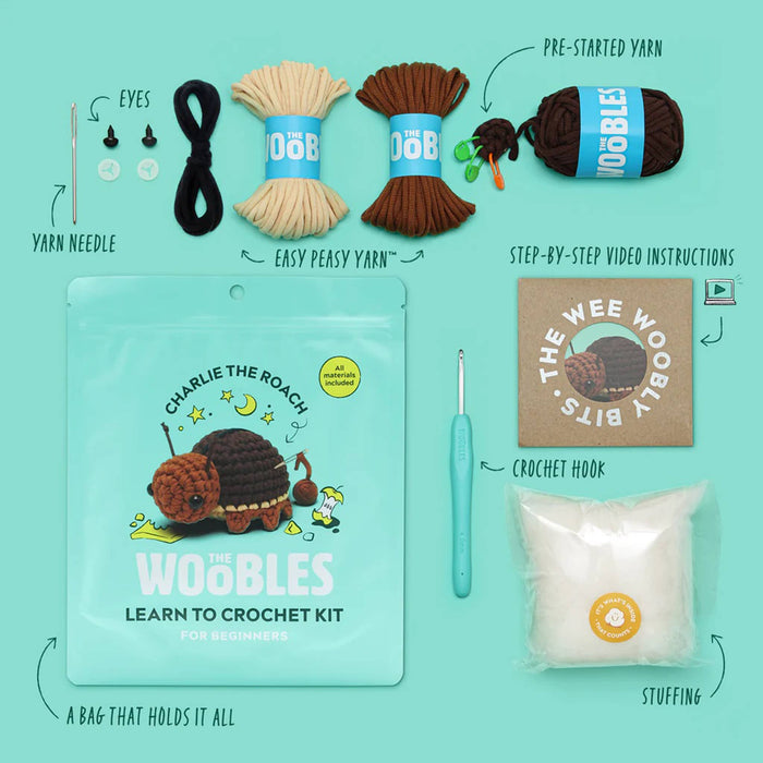 Wobles learn to crochet kit with yarn, hook, and other supplies on a teal background.