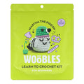 Lime green crochet kit packaging for 'Martha the Pigeon' on a white background.