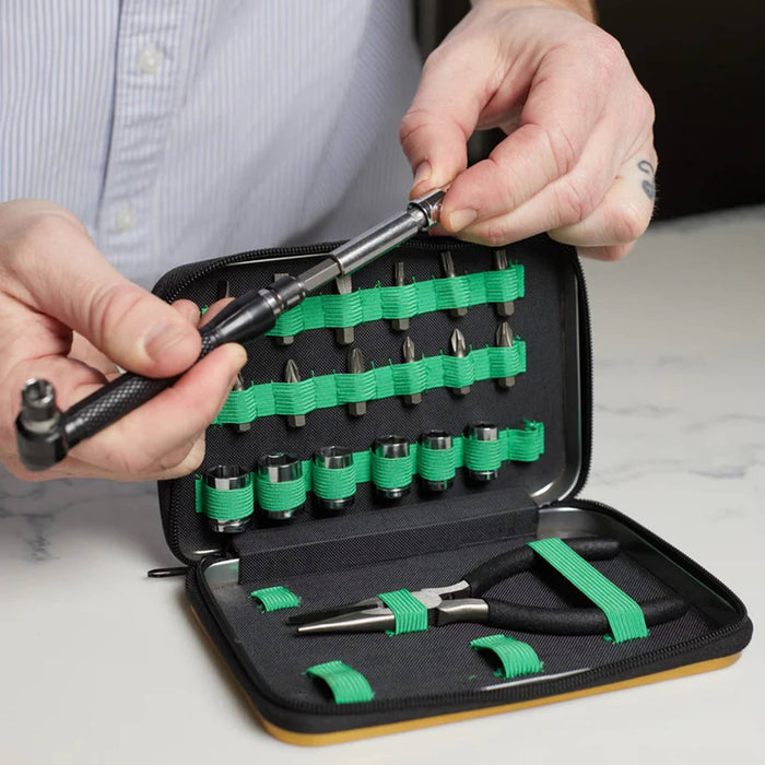 Gentlemen's Hardware Tools of the Trade mini tool kit in tin packaging, with person using sockets.