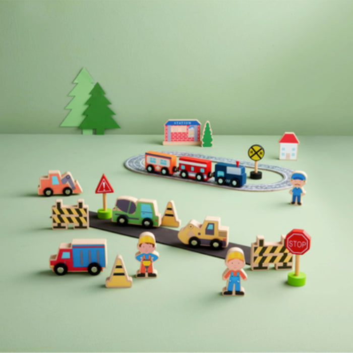Mud Pie Train Track Wood Toy Set, in use behind the matching construction set.