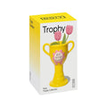 A boxed decorative trophy vase set on a plain white background. The package is mostly white with a bright yellow top and side panel and printed graphics showing a yellow trophy vase with pink tulips and a pink flower badge reading 'Best Friend Award.