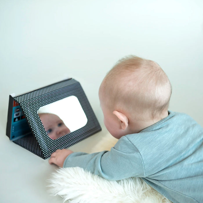 hachette petit collage tummy time peekaboo baby safe mirror with high contrast images in use