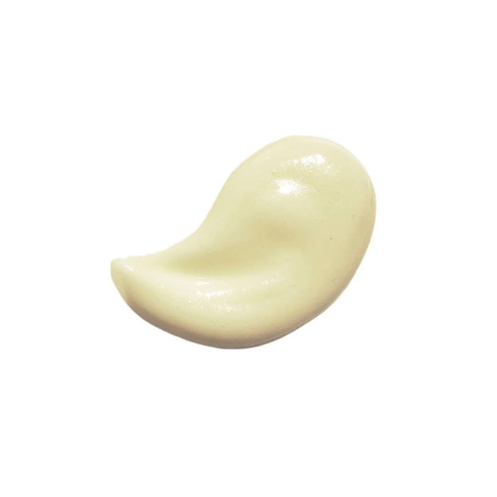 Ursa Major Botanic Buzz Hand Cream, smear to show texture.
