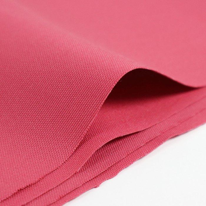 This ReNew Solid is in a soft shade of pink with red undertones.