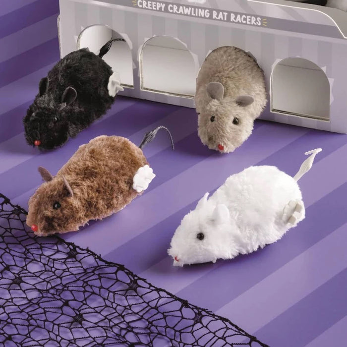 Four plush rat toys in front of their packaging on a purple striped background with spider web design.