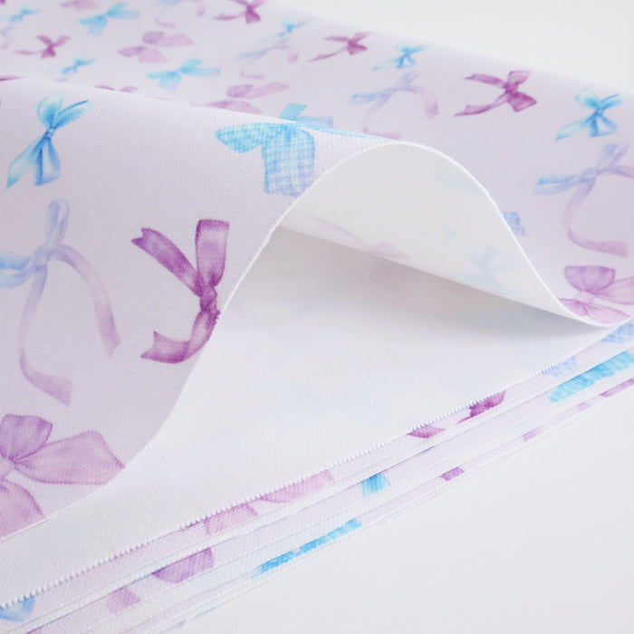 Lovely matching Ballerina Bows print on a very pale lavender/pink solid background.